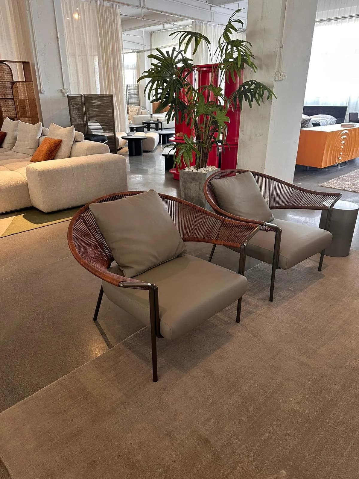 Woven Lounge Chair — Woven rattan with taupe upholstery