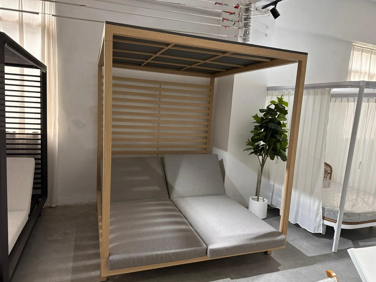 Wooden Canopy Daybed — wood and upholstered fabric