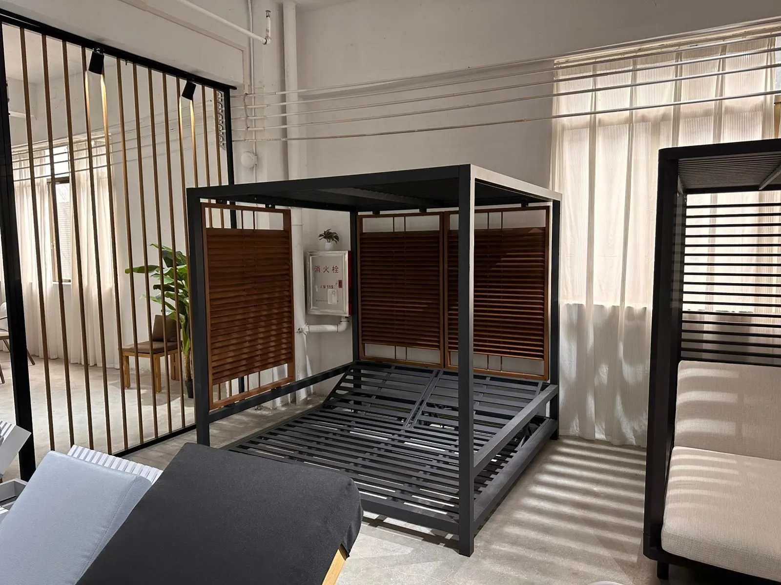 Modern Four Poster Canopy Bed — Metal frame with wood slats and wooden panels