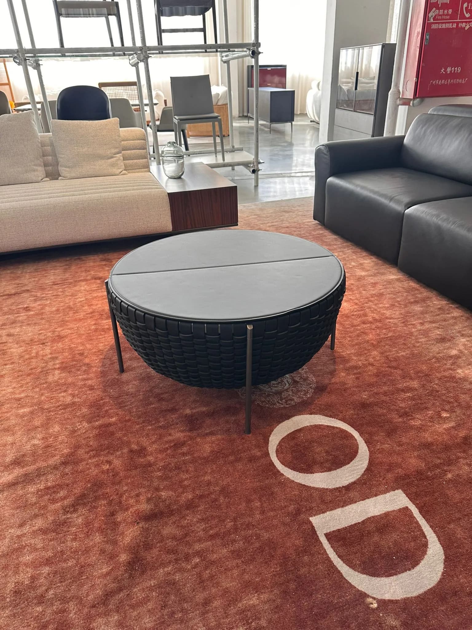 Woven Round Coffee Table — Black woven rattan with gray glass top